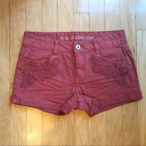 🦄 Burnt orange shorts with flower embroidery!